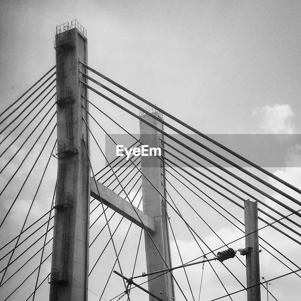 LOW ANGLE VIEW OF BRIDGE AGAINST SKY