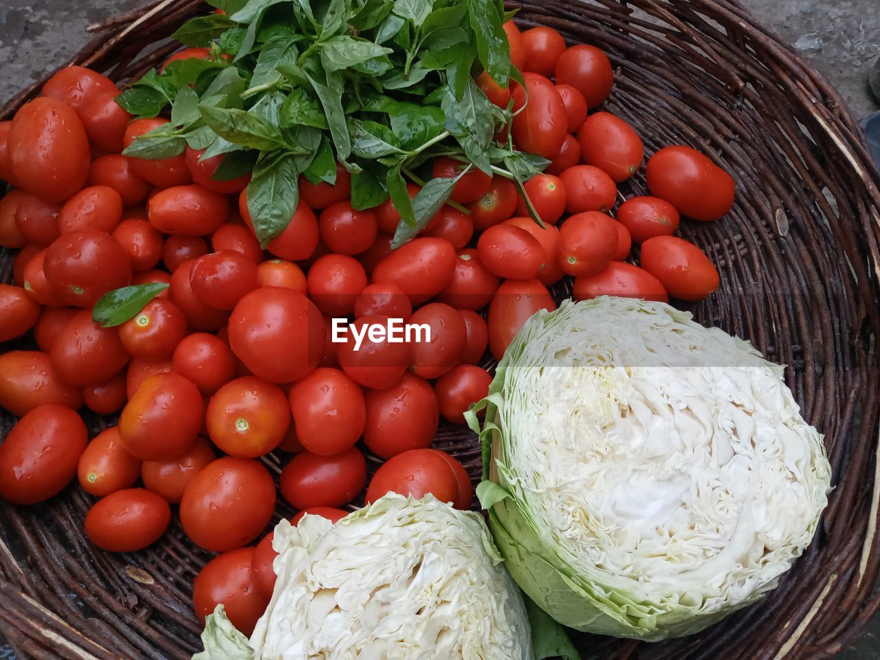 High angle view of tomatoes in basket