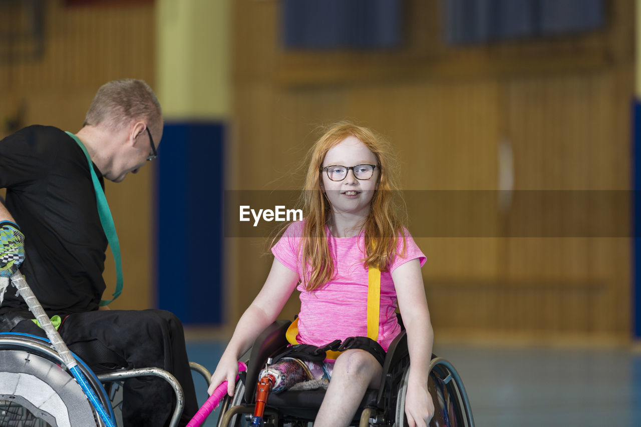 Disabled people playing in gym