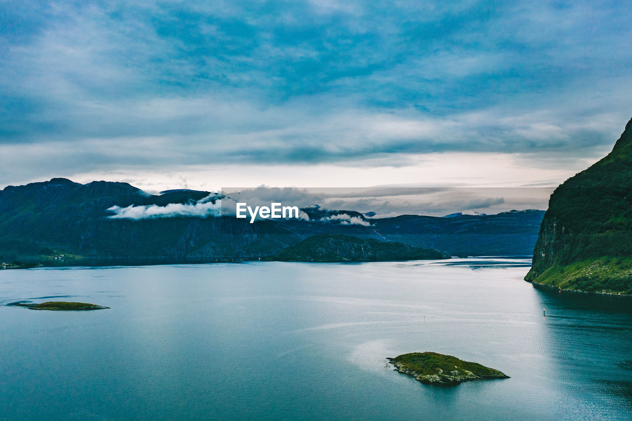 Aerial view of mountain by sea