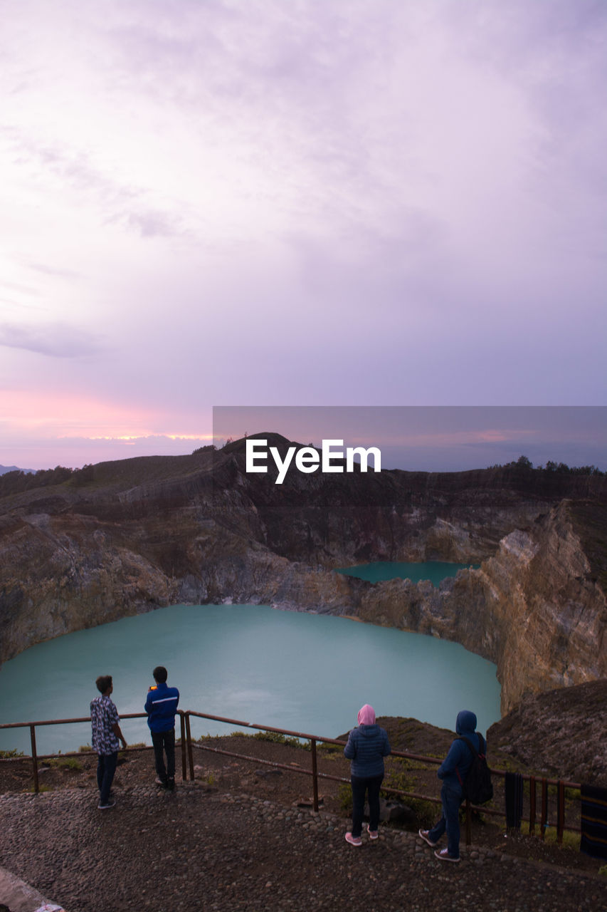 Tourists who are waiting for the sunrise at lake kelimutu, flores