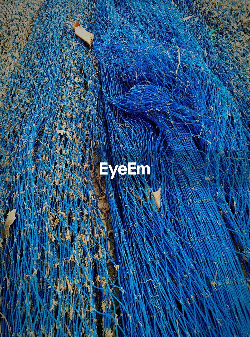 Close-up of blue fishing net