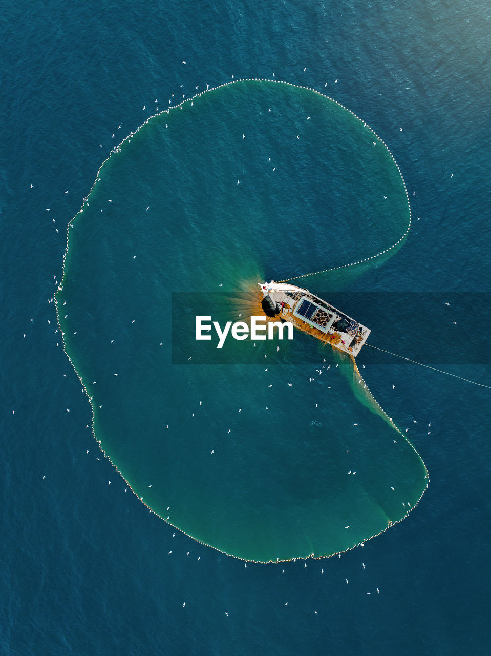 High angle view of boat floating on sea