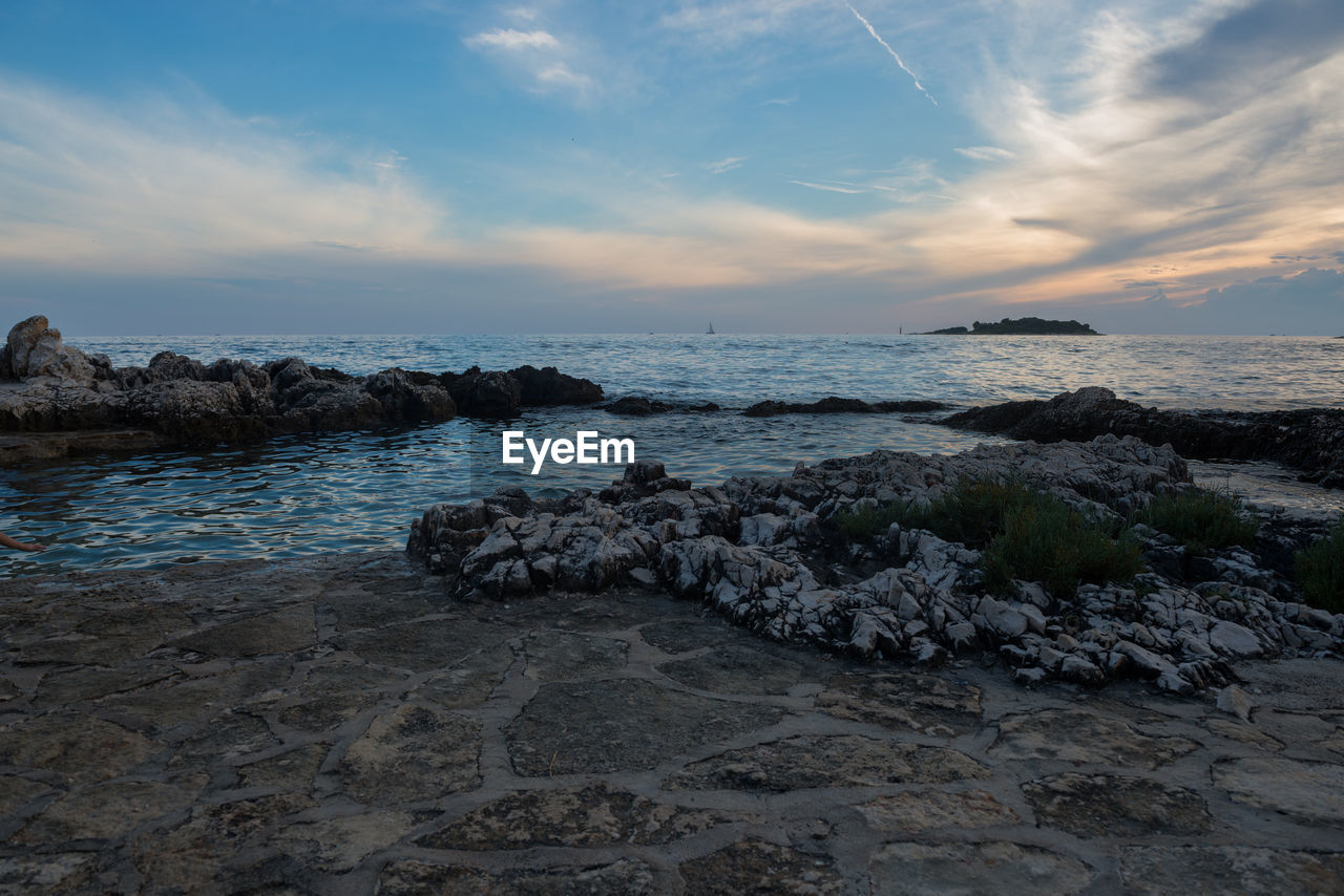 Scenic view of sea against sky during sunset