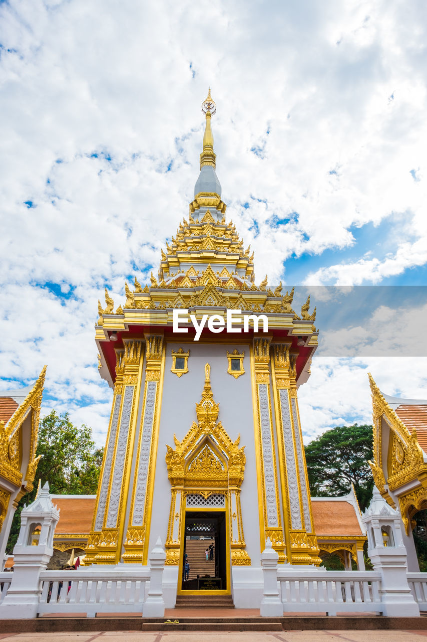 Low angle view of temple against building