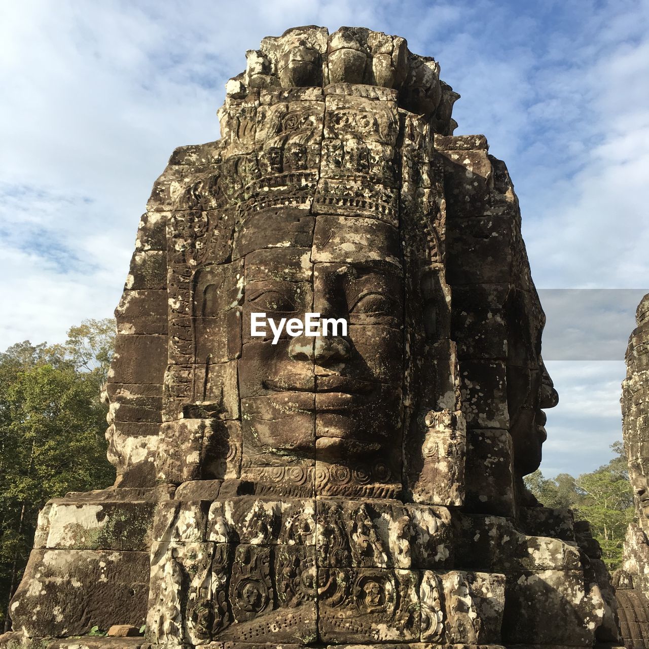 Low angle view of statue against sky