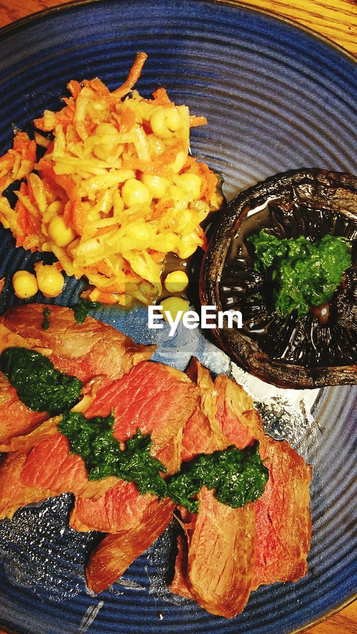 CLOSE-UP OF FOOD SERVED ON PLATE