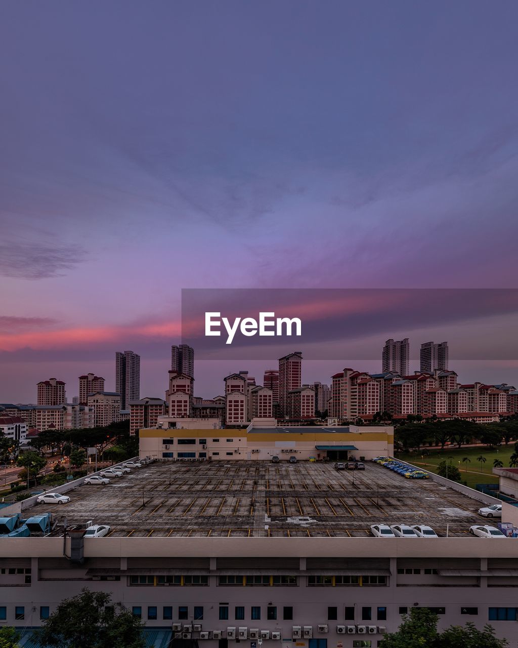 High angle view of buildings against sky during sunset