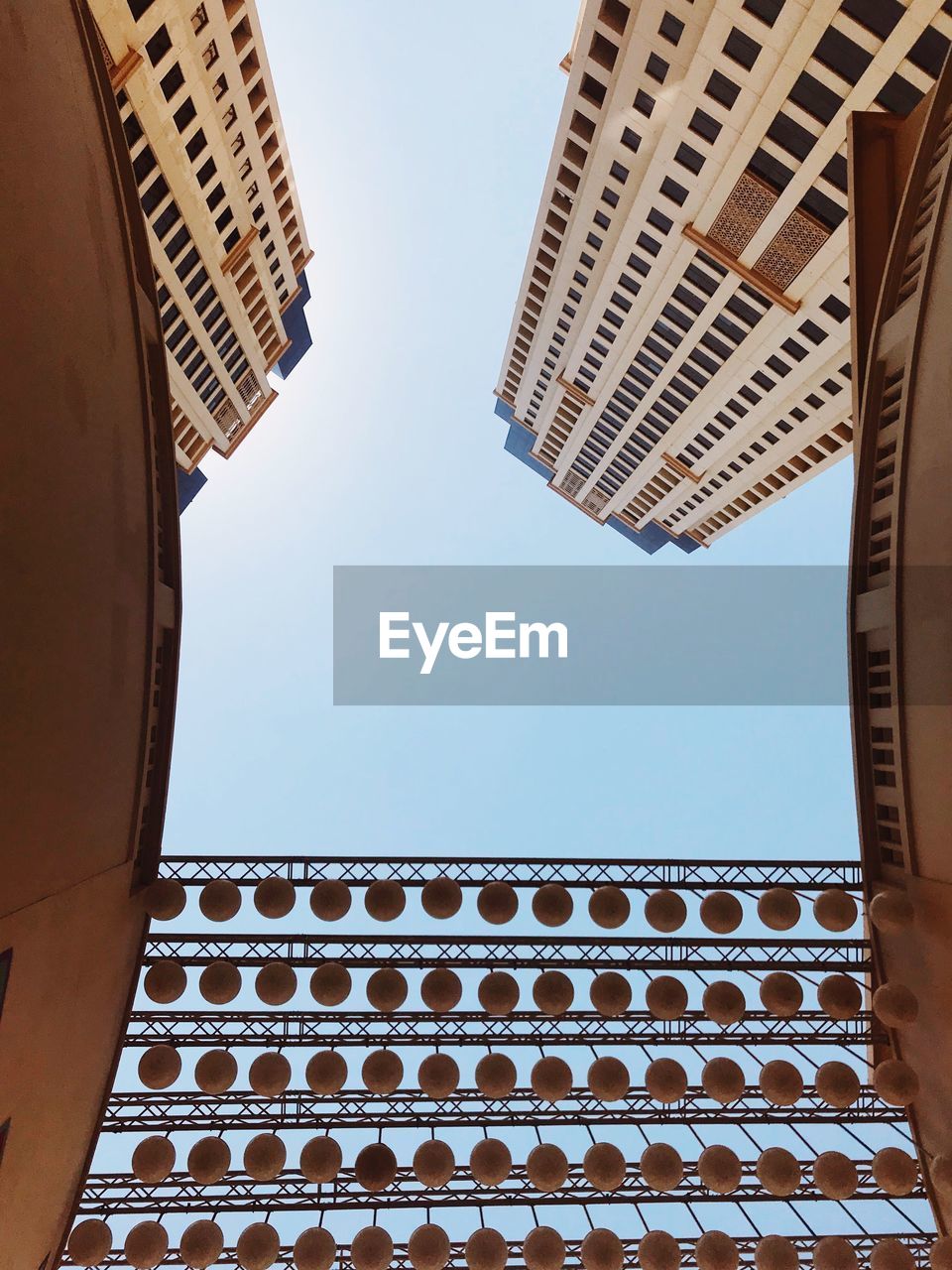 Low angle view of buildings against clear sky
