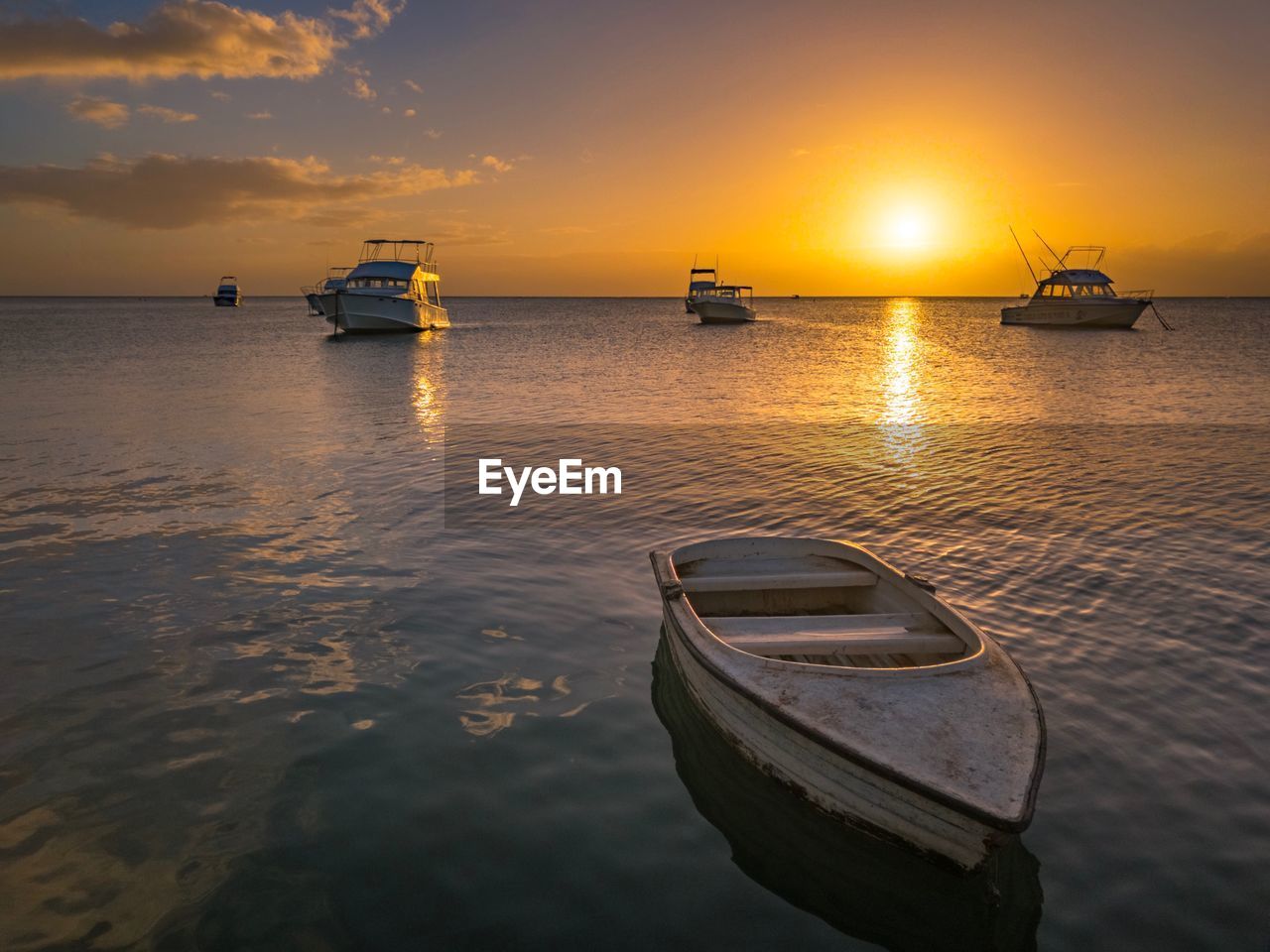 SCENIC VIEW OF SEA DURING SUNSET