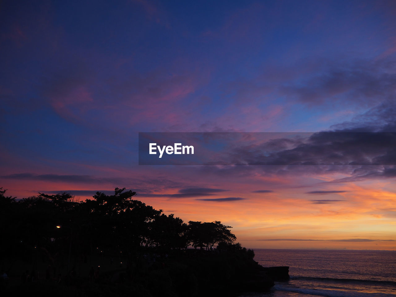 Scenic view of sunset over sea