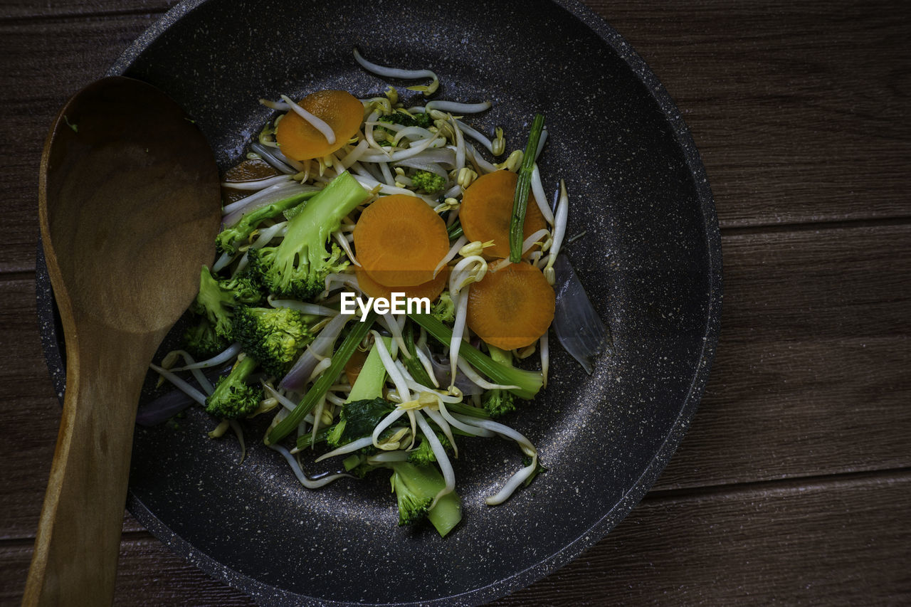 High angle view of chopped vegetables on table