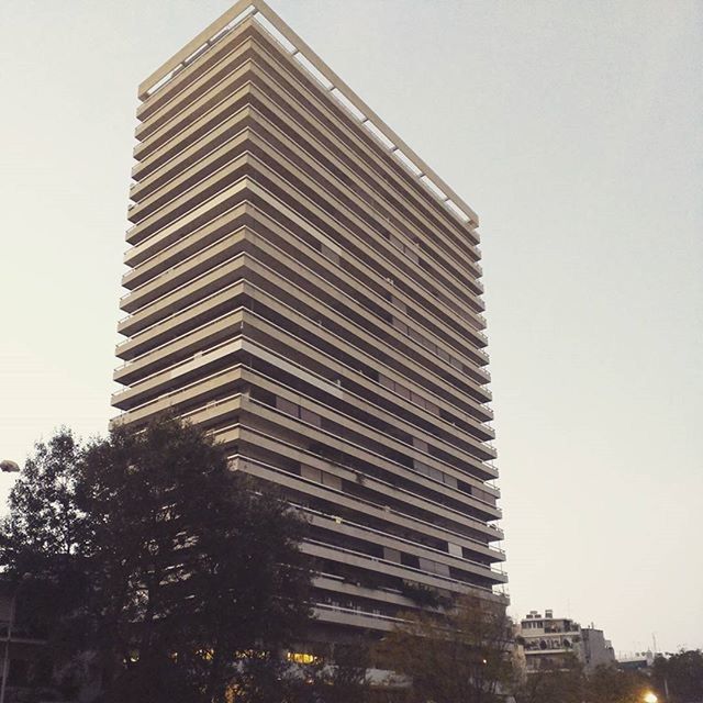 LOW ANGLE VIEW OF MODERN BUILDINGS