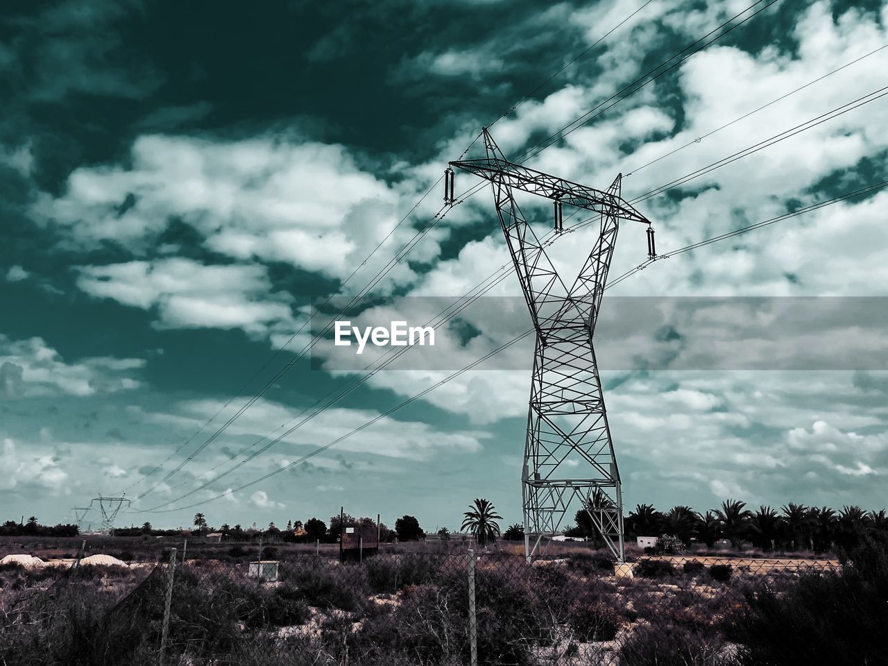 LOW ANGLE VIEW OF ELECTRICITY PYLON AGAINST SKY