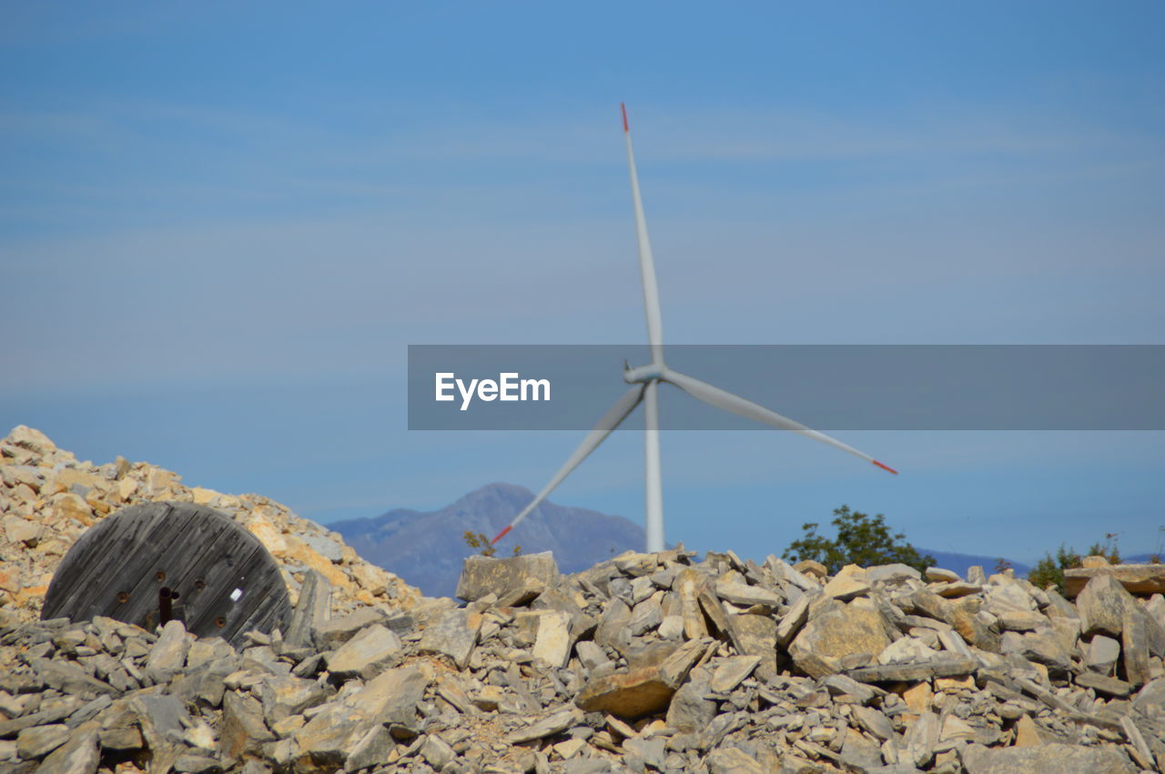 Traditional windmill against clear blue sky