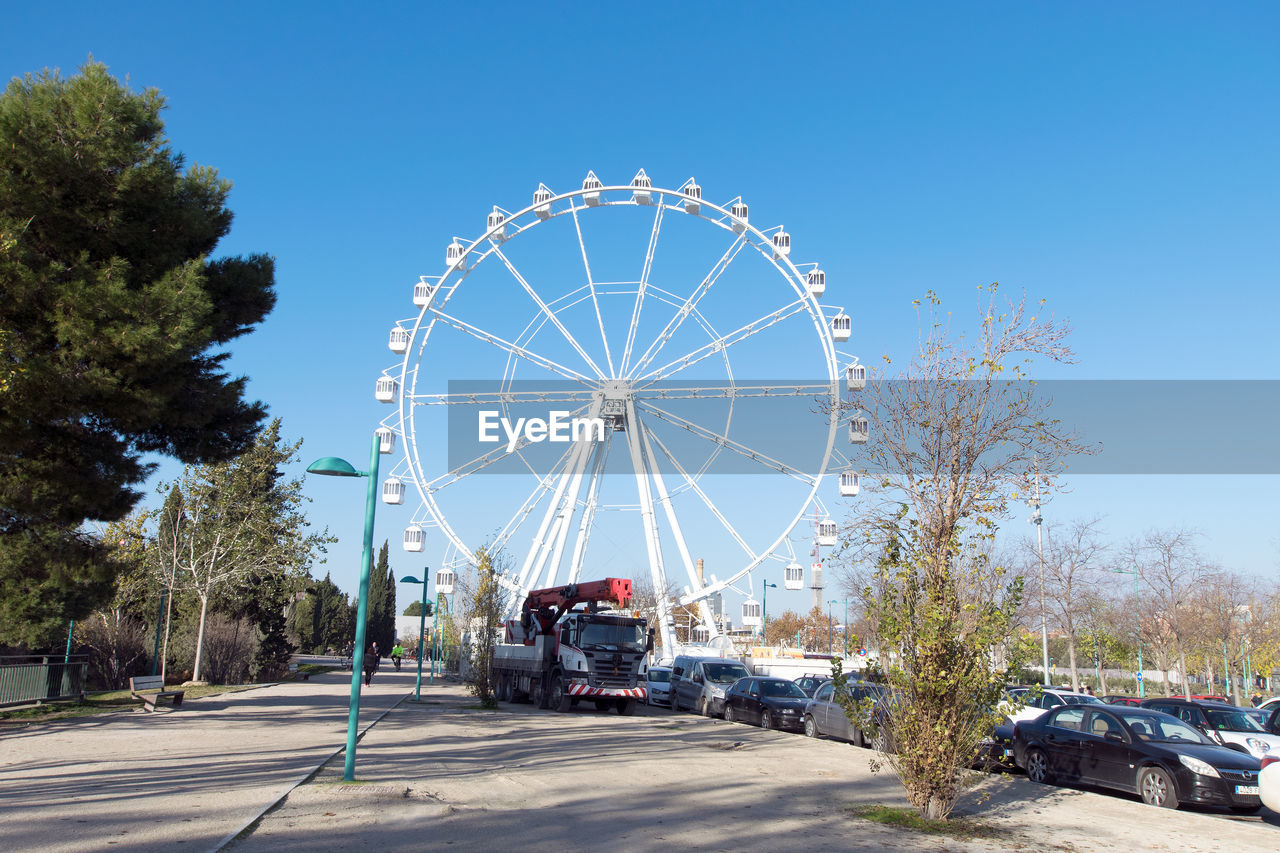 VIEW OF FERRIS WHEEL AGAINST SKY