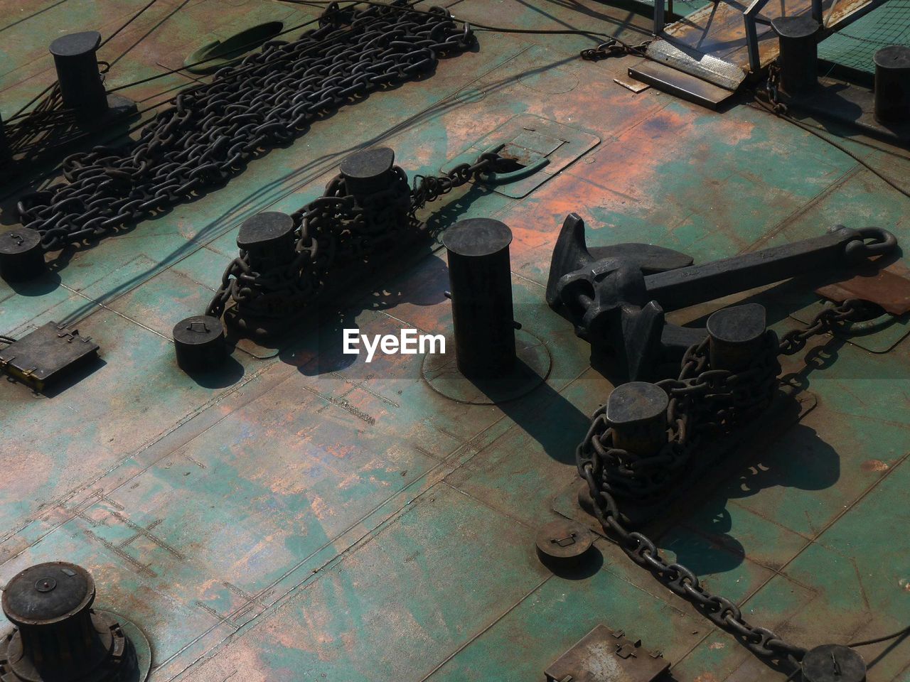 High angle view of chain and equipment in factory