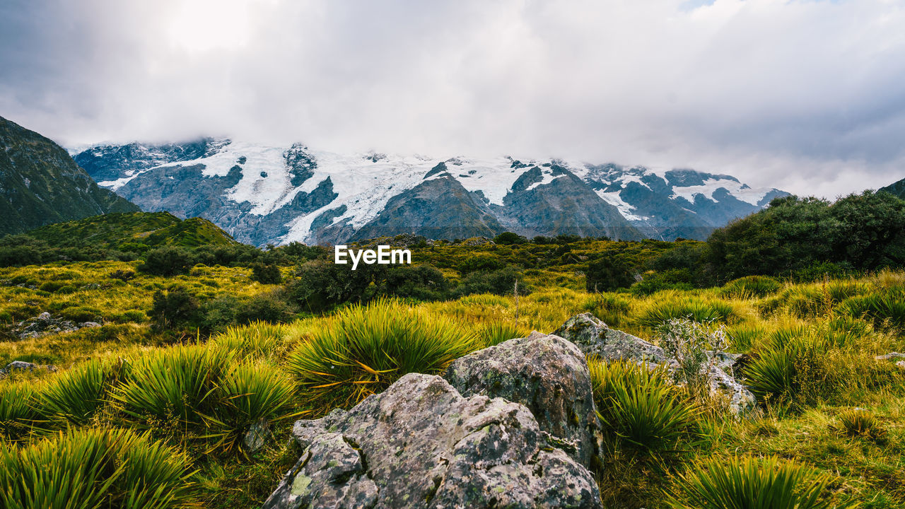 Scenic view of rocky mountains against sky