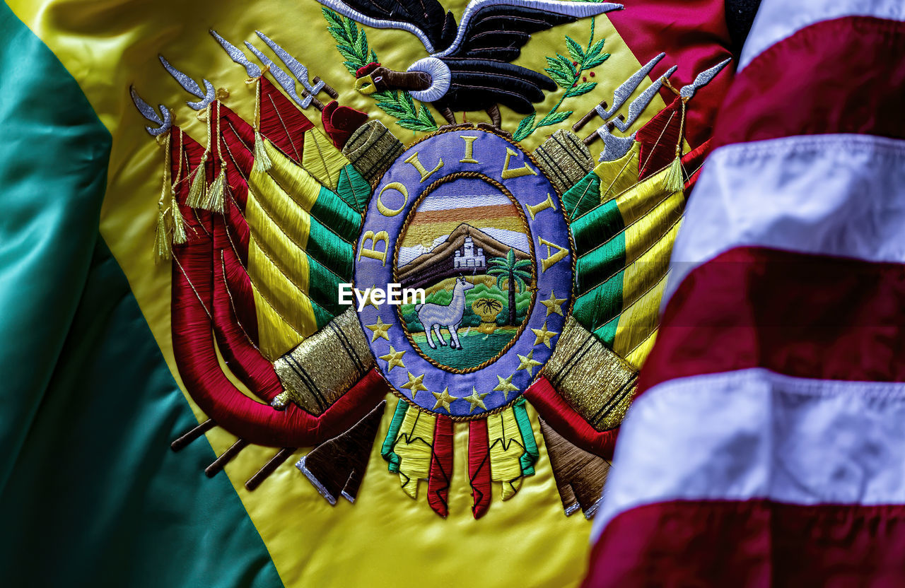 Hispanic day parade nyc 11 9 22 bolivian banner and american flag