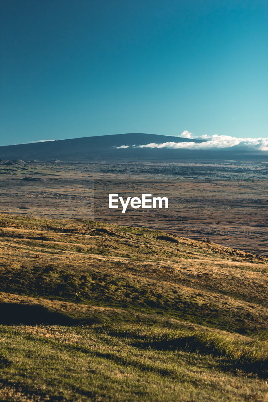 Scenic view of land against sky