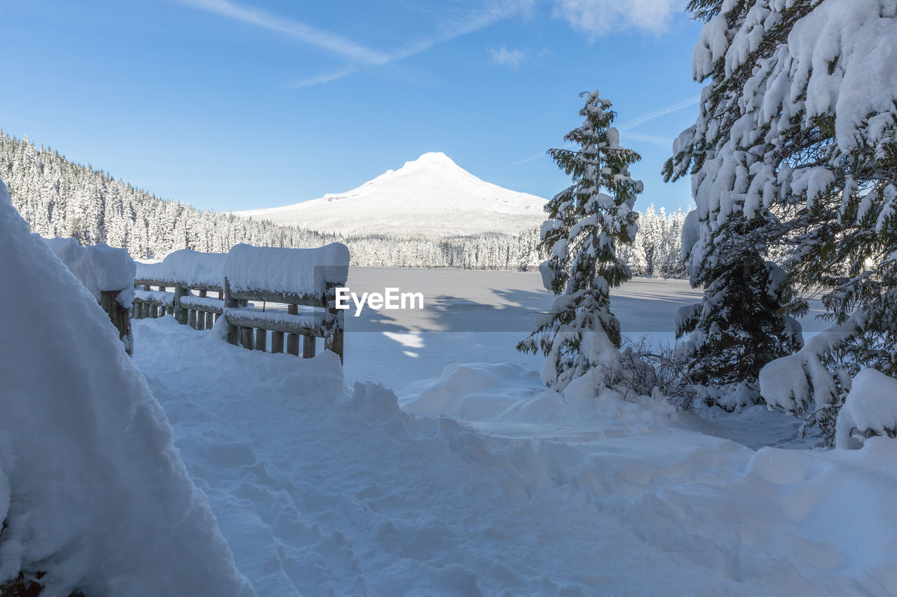 Scenic view of frozen lake against sky