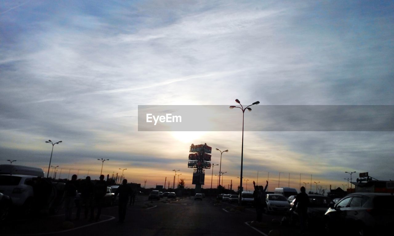 VIEW OF ROAD AGAINST CLOUDY SKY