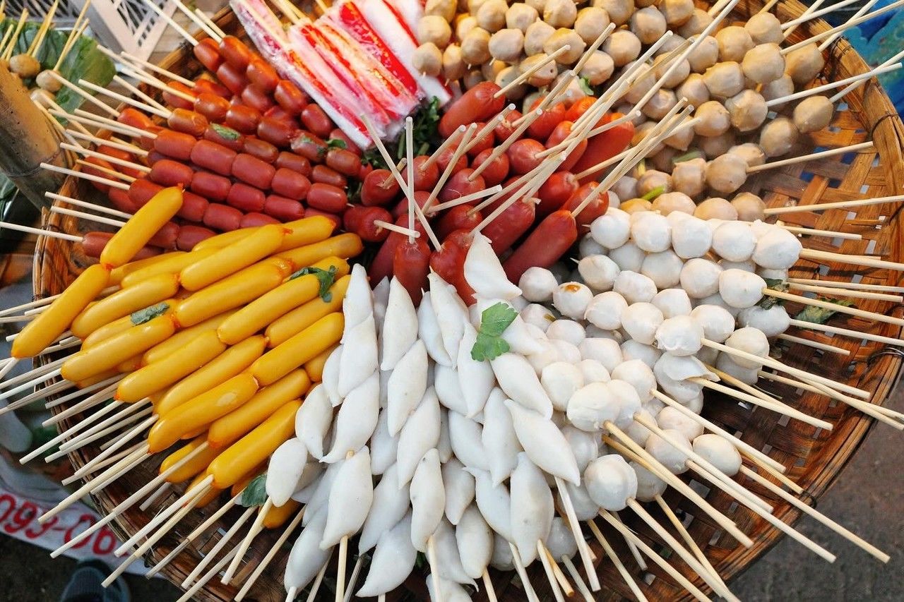 food, large group of objects, food and drink, freshness, no people, market, dish, high angle view, abundance, produce, healthy eating, still life, wellbeing, retail, grilling, arrangement, variation, for sale, skewer, market stall, multi colored, cuisine, business, day, close-up