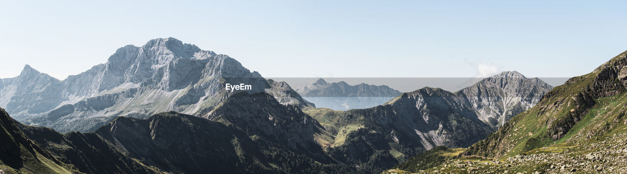 Scenic view of mountains  against clear sky