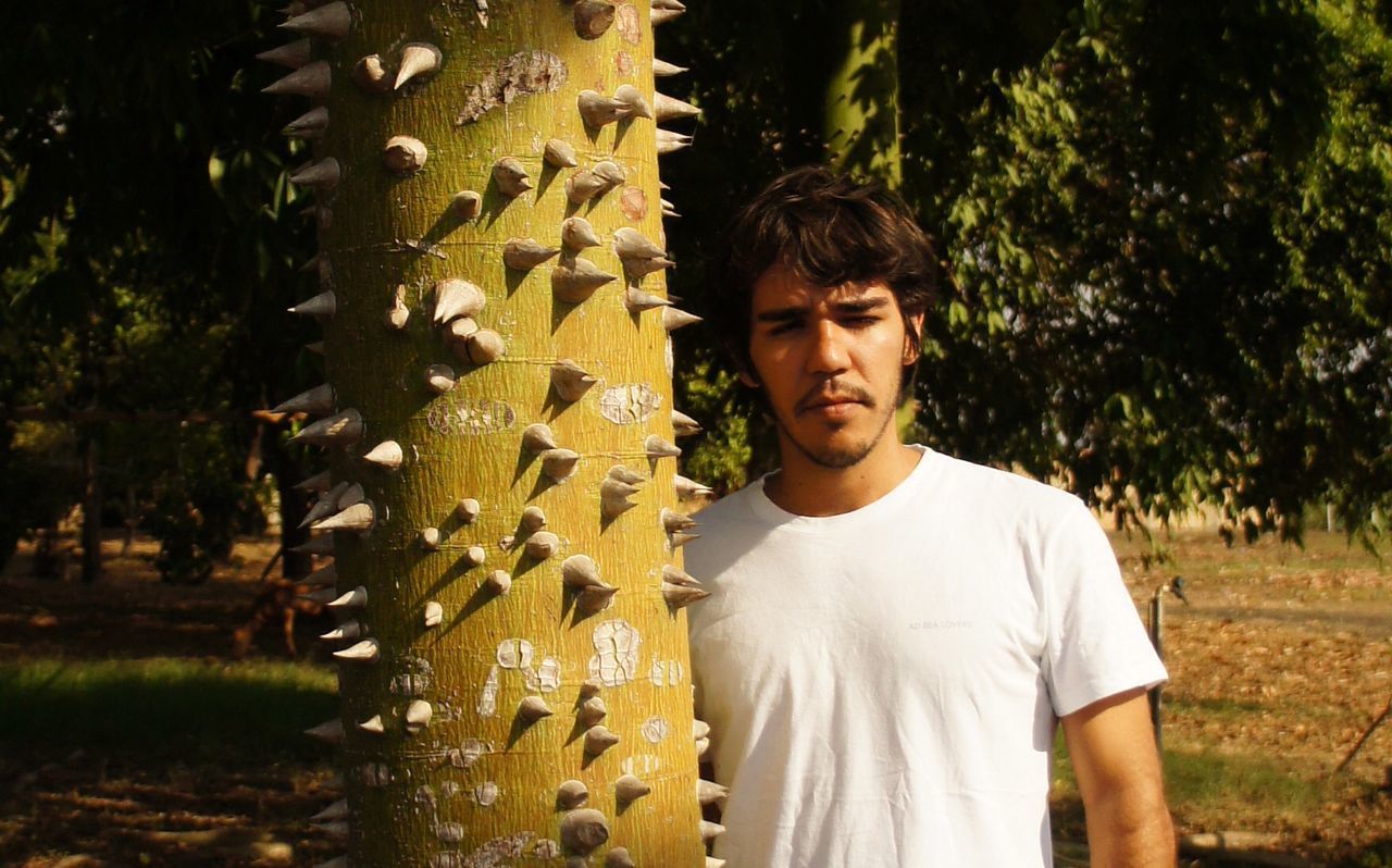 PORTRAIT OF A MAN IN FOREST