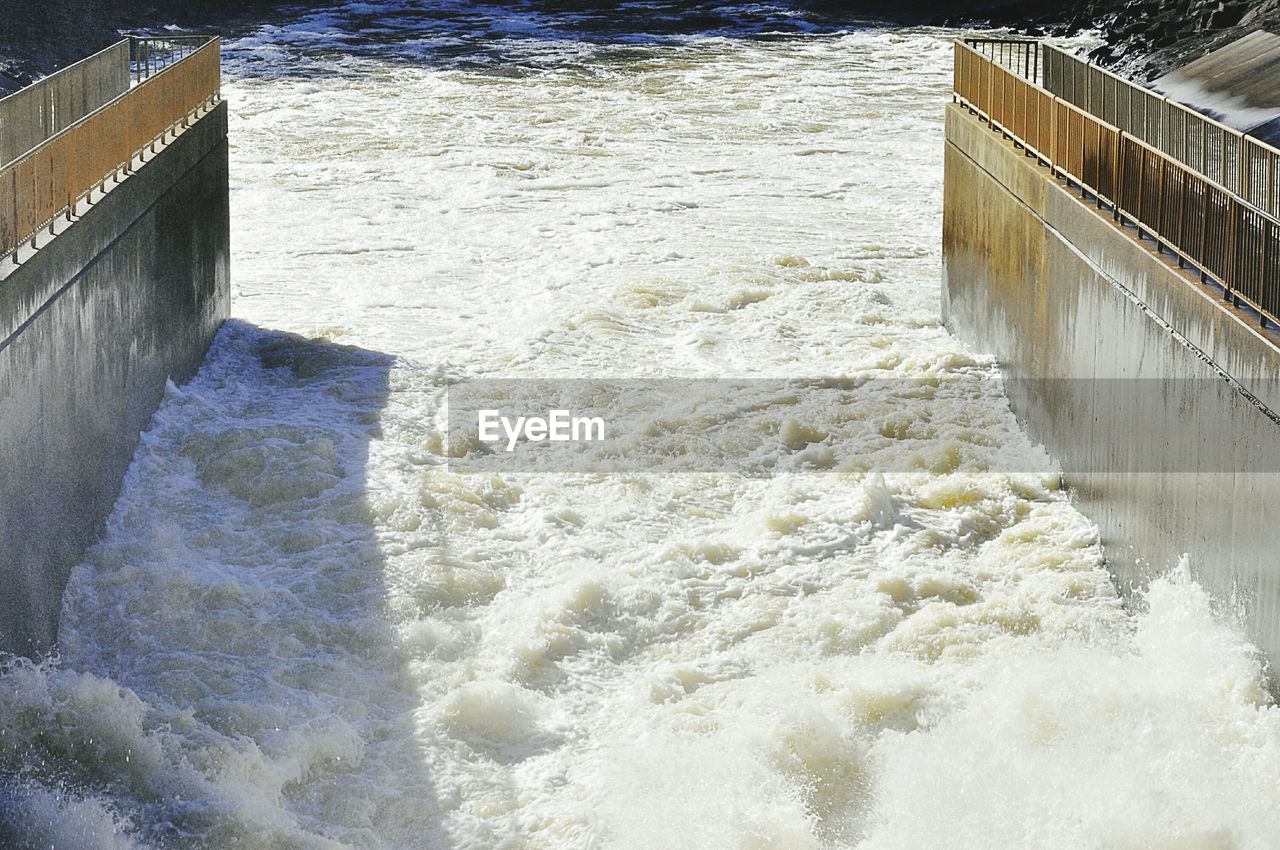 High angle view of dam on sea