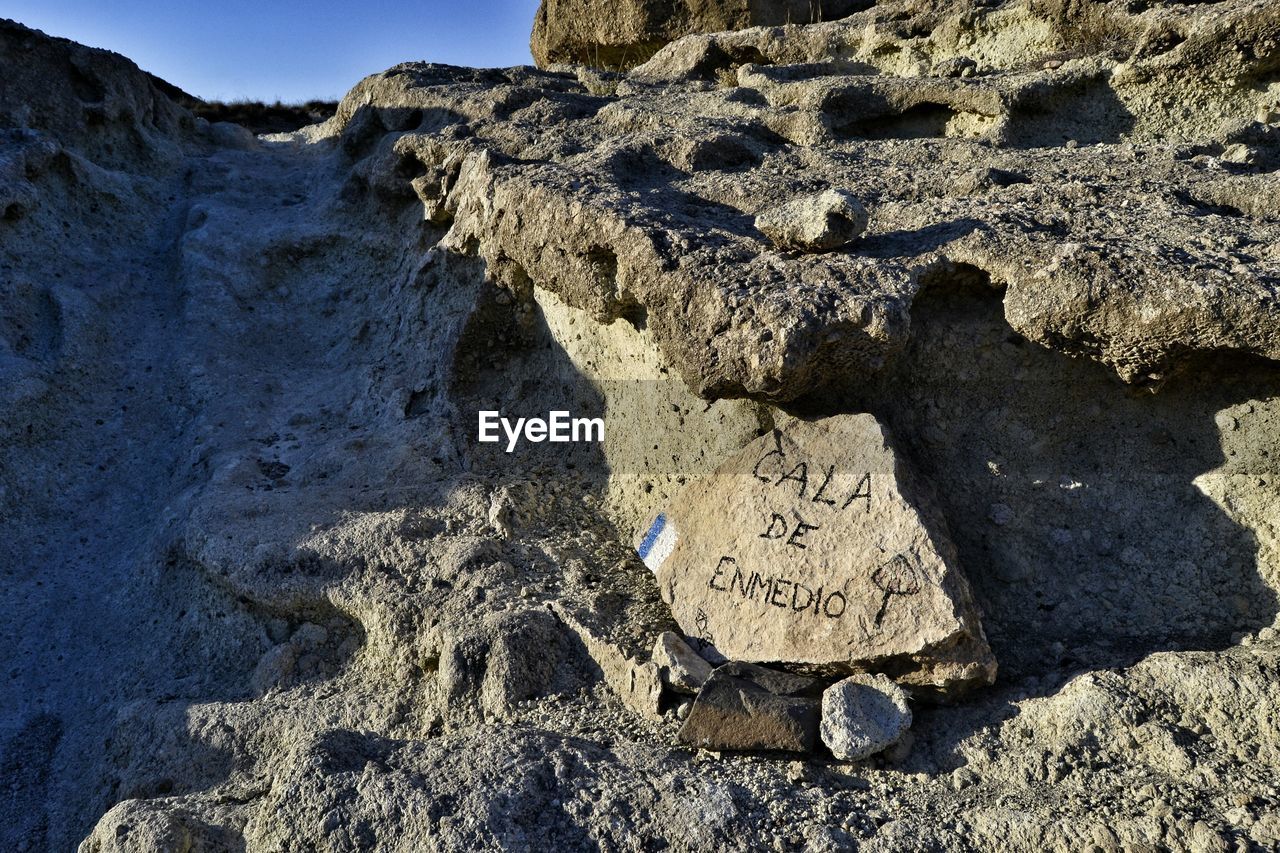 VIEW OF ROCKS AT BEACH