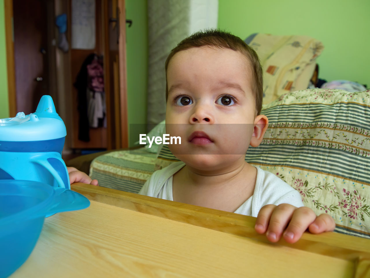 Little cute boy looking at camera close up portrait photograph