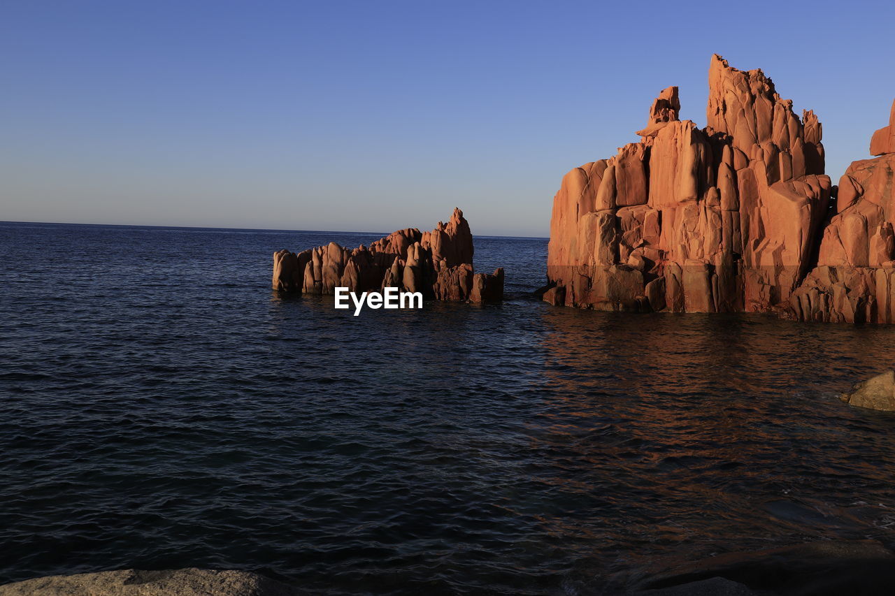 PANORAMIC VIEW OF ROCK FORMATIONS AGAINST SKY