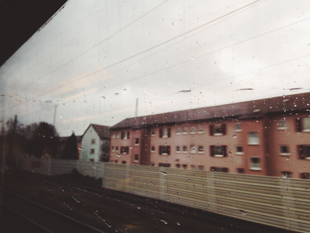 Buildings seen through train window