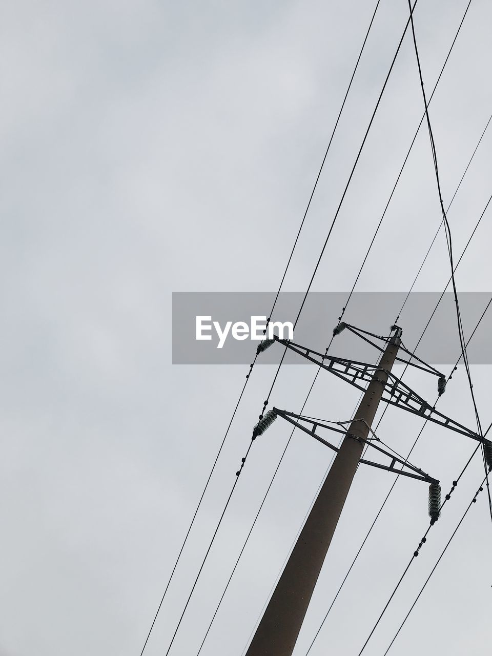 overhead power line, sky, line, electricity, cable, technology, no people, cloud, low angle view, nature, electrical supply, mast, transmission tower, power supply, outdoors, day, sailboat, power generation, pole, power line, tower, antenna, transportation