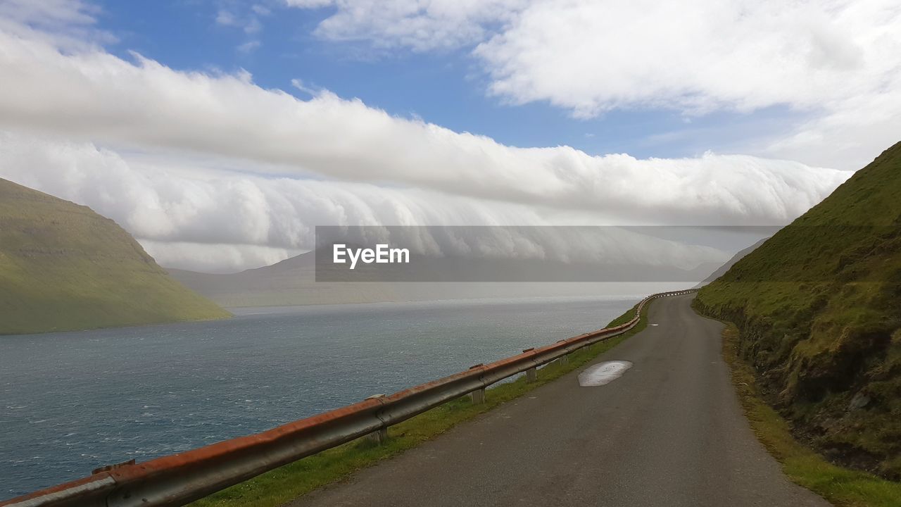 PANORAMIC VIEW OF ROAD AGAINST SKY