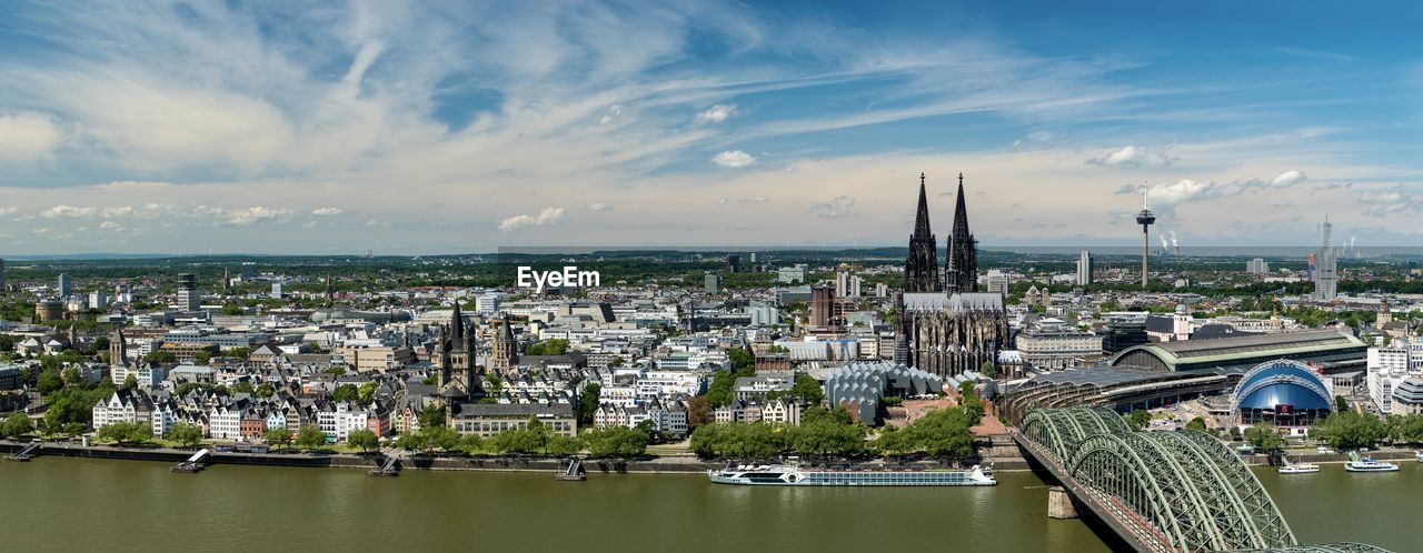 PANORAMIC VIEW OF BUILDINGS AGAINST SKY