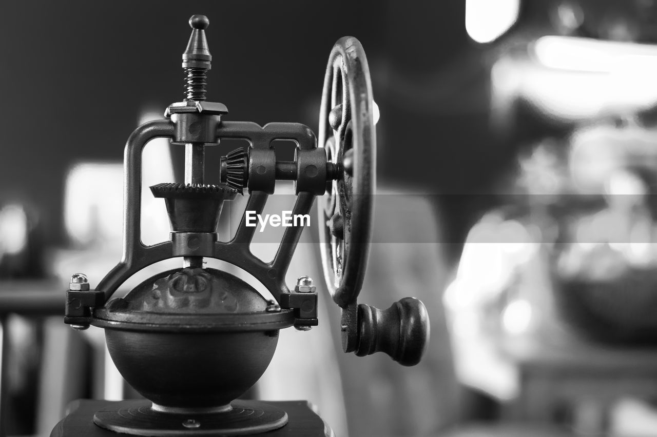 CLOSE-UP OF MACHINE IN KITCHEN