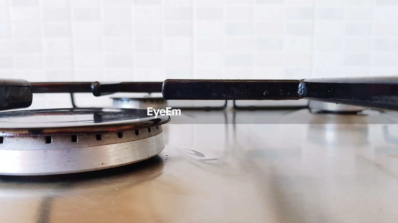 CLOSE-UP OF ELECTRIC FAN IN KITCHEN