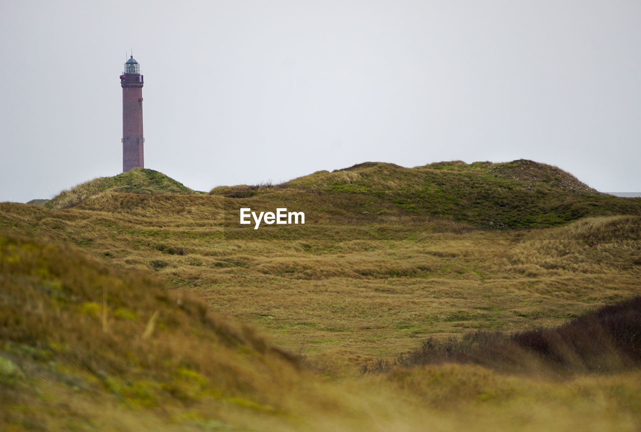 Scenic view of light house on hill 