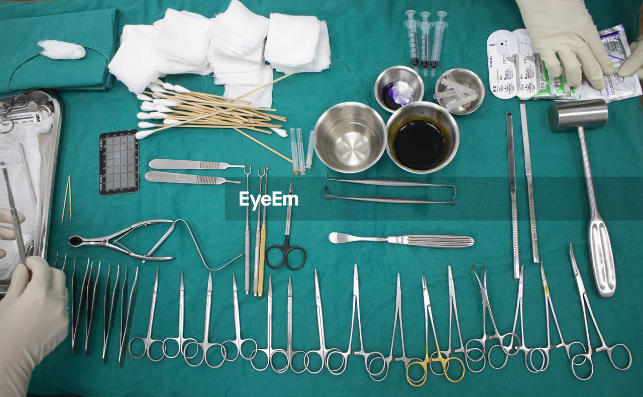 medical equipment, kitchen utensil, indoors, directly above, surgical equipment, eating utensil, high angle view, table, large group of objects, fork, healthcare and medicine, scissors, knolling - concept, household equipment, no people, occupation, spoon, tableware, order, work tool