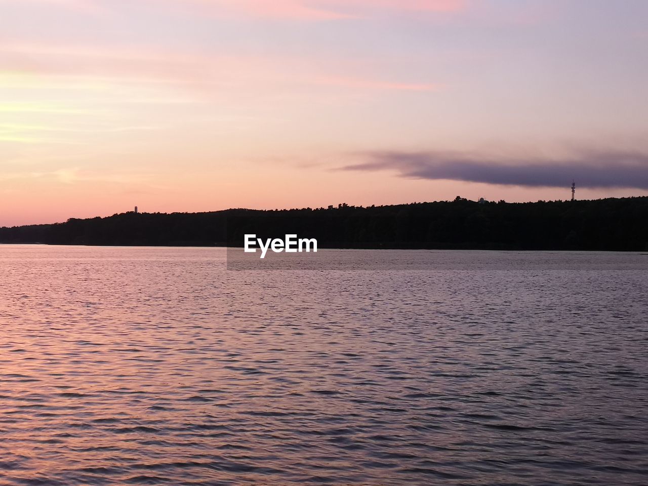 SCENIC VIEW OF LAKE DURING SUNSET