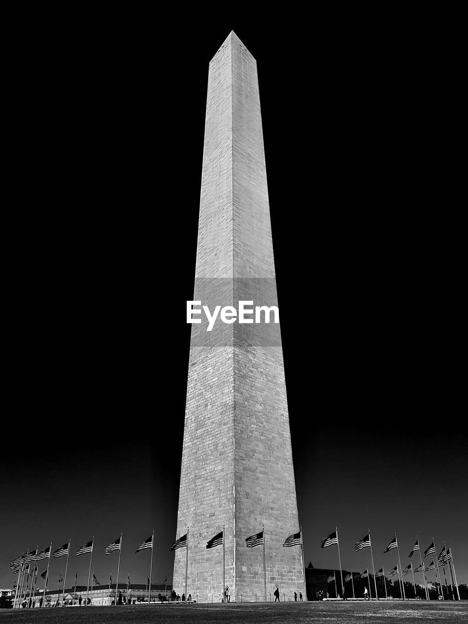 Low angle view of monument against sky at night