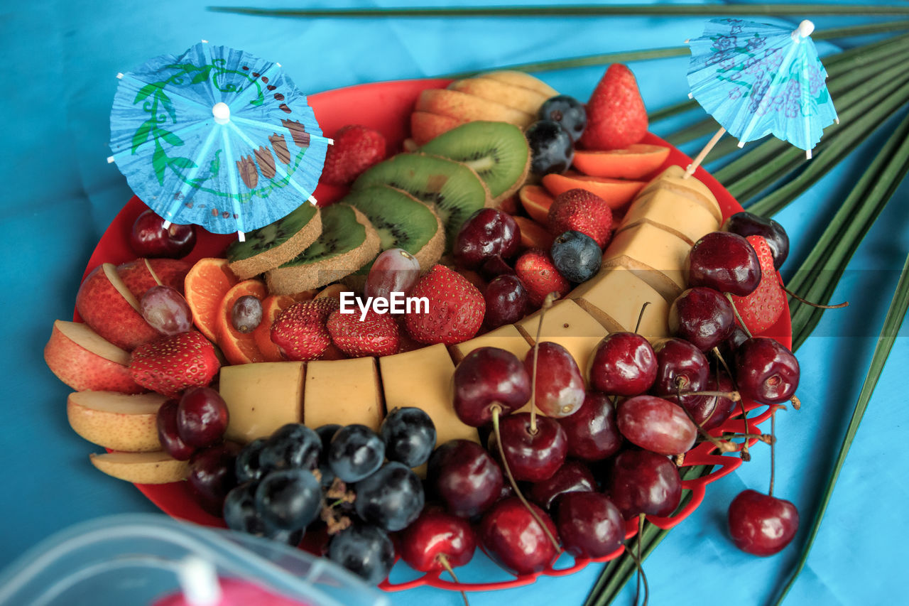 High angle view of fruits in plate on table