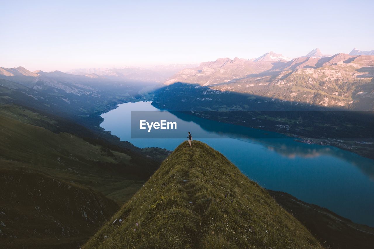High angle view of lake by mountains