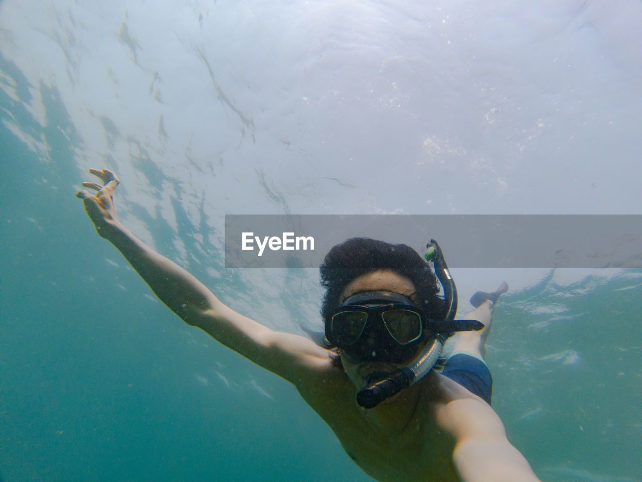 Portrait of man swimming in sea