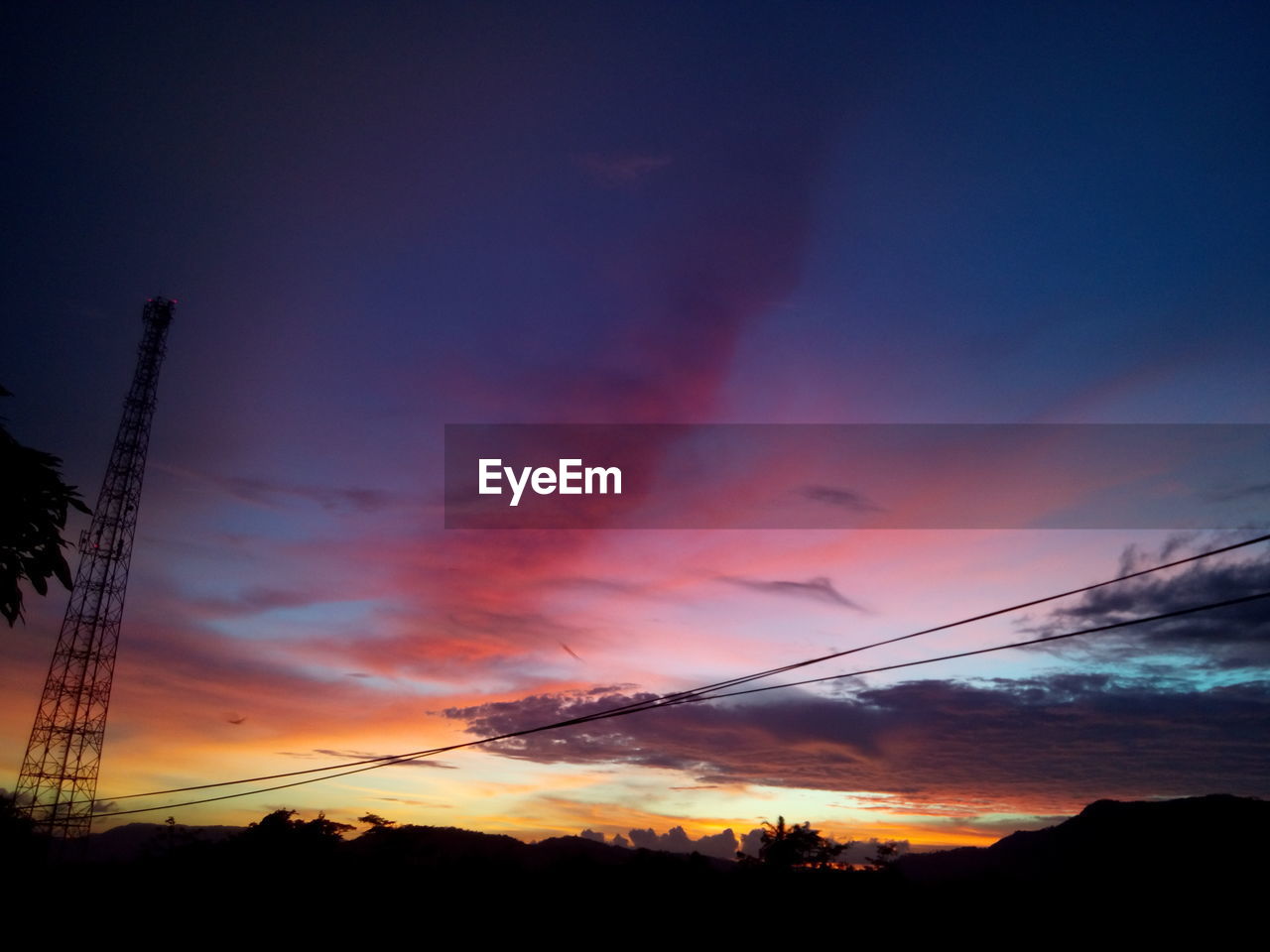 Low angle view of dramatic sky during sunset