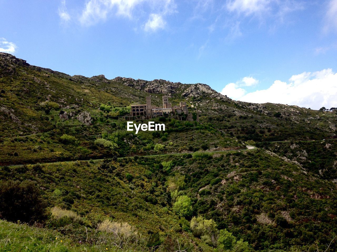 SCENIC VIEW OF MOUNTAIN AGAINST SKY