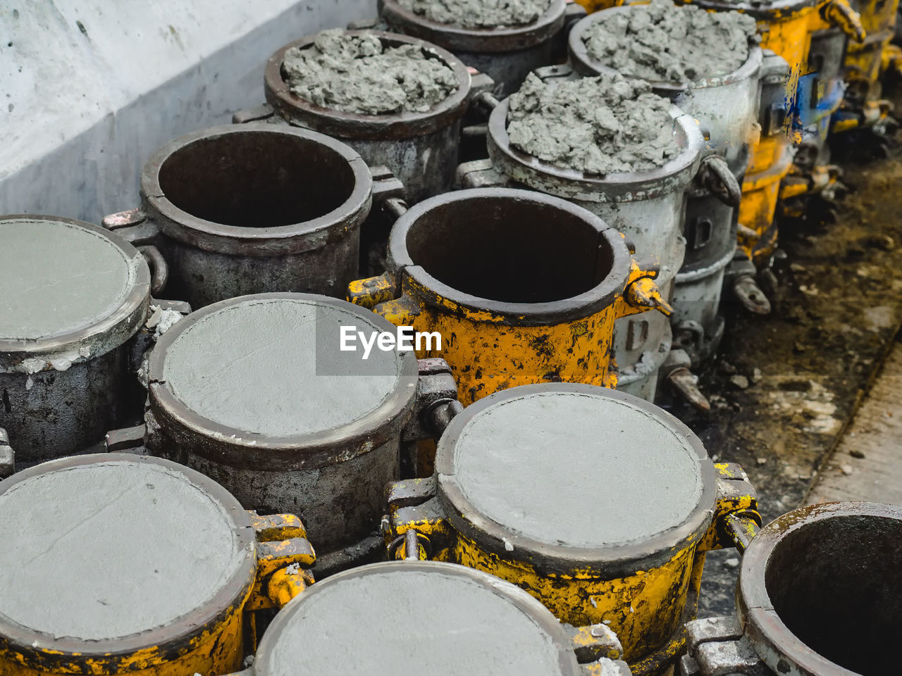 High angle view of cement in containers