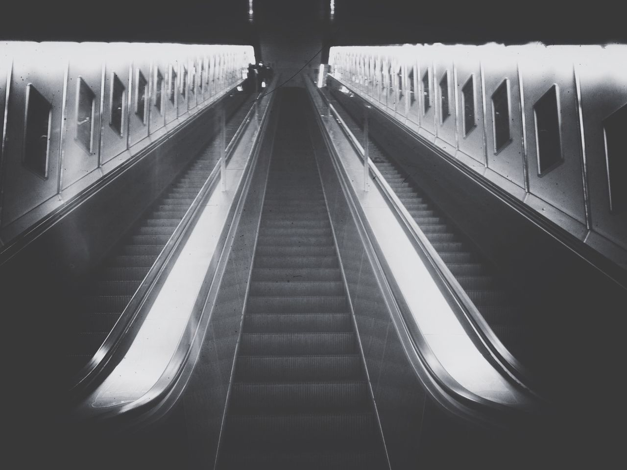 Low angle view of escalator in subway